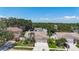 Aerial view of a single-story home with landscaping and lawn at 11216 Longbrooke Dr, Riverview, FL 33579