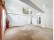Bright living room with sliding closet and view to next room at 11216 Longbrooke Dr, Riverview, FL 33579