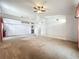 Large living area with ceiling fan and open floor plan at 11216 Longbrooke Dr, Riverview, FL 33579