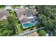 Aerial view of a pool enclosed by a screened cage at a private residence at 11216 Longbrooke Dr, Riverview, FL 33579
