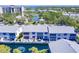 Beautiful aerial view of waterfront condos with manicured grounds and a lovely canal at 11531 Shipwatch Dr # 1030, Largo, FL 33774
