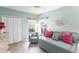 Charming bedroom with daybed, plush pillows, and an accent chair at 11531 Shipwatch Dr # 1030, Largo, FL 33774