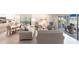 Open living room with eat-in kitchen, dining room, and access to the lanai at 11531 Shipwatch Dr # 1030, Largo, FL 33774