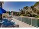 Relaxing patio with lounge chairs offering peaceful views of the surrounding landscape at 11531 Shipwatch Dr # 1030, Largo, FL 33774