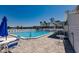 Community pool with lounging area and well-maintained deck offering a relaxing outdoor space at 11531 Shipwatch Dr # 1030, Largo, FL 33774