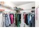 Spacious walk-in closet with metal shelving and hanging clothes at 11531 Shipwatch Dr # 1030, Largo, FL 33774