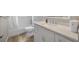 Bright bathroom featuring a modern vanity, sleek fixtures, and wood-look flooring at 1155 Withlacoochee St, Safety Harbor, FL 34695
