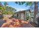 Charming detached garage featuring a brick-paved area, enhancing its curb appeal at 1155 Withlacoochee St, Safety Harbor, FL 34695