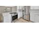 Bright and airy kitchen with stainless steel appliances and white cabinets providing modern elegance at 1155 Withlacoochee St, Safety Harbor, FL 34695