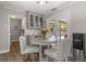 Cozy breakfast nook with view to pool and stylish seating at 1211 S Druid Ln, Tampa, FL 33629