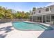 A beautiful in-ground pool with plenty of trees around at 1211 S Druid Ln, Tampa, FL 33629