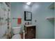 Well-lit bathroom with a decorative shower curtain and vanity at 13057 89Th Ave, Seminole, FL 33776
