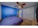 Bedroom featuring a ceiling fan, closet and natural light at 13057 89Th Ave, Seminole, FL 33776