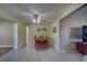 Open dining room with a ceiling fan, tile floors, and ample space for Gathering gatherings at 13057 89Th Ave, Seminole, FL 33776