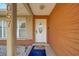 Inviting entryway showcasing the front door with decorative glass and a welcoming mat at 13057 89Th Ave, Seminole, FL 33776