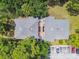 Aerial view of the building showing a rooftop and balcony at 134 Sycamore Ln # H, Oldsmar, FL 34677