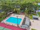 Community pool, hot tub, playground, and green spaces, perfect for Gathering fun and relaxation by the lakeside at 134 Sycamore Ln # H, Oldsmar, FL 34677