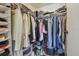 Spacious walk-in closet with shelving and hanging rods for maximum storage at 134 Sycamore Ln # H, Oldsmar, FL 34677
