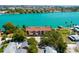 A waterfront condo on lush property has ample parking for residents and visitors at 135 92Nd Ave # 2, Treasure Island, FL 33706