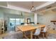 Open concept dining and living areas offering scenic waterfront views at 135 92Nd Ave # 2, Treasure Island, FL 33706