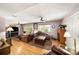 Comfortable living room with hardwood floors, furniture set and natural light at 1399 Leeward Ave, Spring Hill, FL 34606