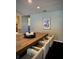 Dining room featuring a large wooden table with seating for six with neutral wall color at 14678 Village Glen Cir, Tampa, FL 33618