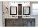 Bathroom featuring dual sinks with granite countertops and dark wood cabinetry, offering ample storage at 18714 Chemille Dr, Lutz, FL 33558