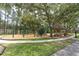 A well-maintained neighborhood playground offers fun for all ages, with a nearby picnic shelter at 18714 Chemille Dr, Lutz, FL 33558