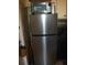 Updated kitchen features a stainless steel refrigerator and a toaster oven above at 200 N Betty Ln # 5F, Clearwater, FL 33755