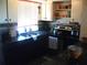 Updated kitchen featuring dark countertops and stainless steel appliances, with a window view at 200 N Betty Ln # 5F, Clearwater, FL 33755