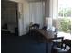 Inviting lobby area with ample seating, modern lamps, mailboxes, and natural light streaming through the windows at 200 N Betty Ln # 5F, Clearwater, FL 33755