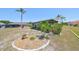 A lush backyard with meticulously manicured landscaping adds natural beauty to the home at 2004 Berry Roberts Dr, Sun City Center, FL 33573