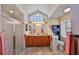 Bright bathroom featuring double sinks, granite countertops, stand-up shower and lots of natural light at 2004 Berry Roberts Dr, Sun City Center, FL 33573