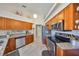 Well-equipped kitchen boasting stainless steel appliances, granite countertops, and stylish cabinetry at 2004 Berry Roberts Dr, Sun City Center, FL 33573