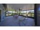 Enclosed patio with lots of seating, ceiling fans and string lights at 2004 Berry Roberts Dr, Sun City Center, FL 33573