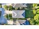 Aerial view of a well-maintained home with a large backyard and beautiful landscaping at 20203 Merry Oak Ave, Tampa, FL 33647