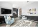 Bright and airy living room with designer decor, comfortable seating, and a sleek TV setup at 20203 Merry Oak Ave, Tampa, FL 33647