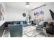 Inviting living room with a large window, plush seating, and stylish decor, perfect for relaxation and entertaining at 20203 Merry Oak Ave, Tampa, FL 33647