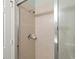 Tiled shower with glass doors and modern showerhead, providing a refreshing and clean bathing experience at 20203 Merry Oak Ave, Tampa, FL 33647