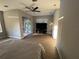 Spacious bedroom with wood floors, ceiling fan, and sliding glass doors to the outside at 2111 Park Crescent Dr, Land O Lakes, FL 34639
