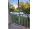 Screened patio with view of the pond and trees at 2111 Park Crescent Dr, Land O Lakes, FL 34639
