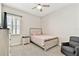 Bedroom with carpet flooring, a ceiling fan, and light gray walls at 21506 Snowy Orchid Ter, Land O Lakes, FL 34637