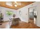Dining room with wood ceiling, hardwood floors and plenty of light at 2231 Nichols Rd, Lithia, FL 33547