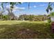 Expansive front lawn offers plenty of room to stretch, play and landscape with mature trees at 2231 Nichols Rd, Lithia, FL 33547