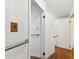 Hallway featuring a handrail and access to the elevator at 2231 Nichols Rd, Lithia, FL 33547