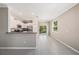 Modern kitchen features granite countertops, stainless steel appliances, and an island at 23378 Papyrus Way, Lutz, FL 33549