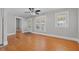Inviting living room with hardwood floors, white trim, and a vintage feel at 2450 3Rd N Ave, St Petersburg, FL 33713