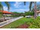 Beautiful waterfront property with a boat lift, dock and lush landscaping creating a serene outdoor oasis at 2512 S Dundee St, Tampa, FL 33629