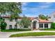 Stunning two-story home featuring a beautiful terra cotta roof and manicured front lawn at 2512 S Dundee St, Tampa, FL 33629