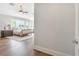 Spacious main bedroom with hardwood floors and large windows providing ample natural light at 2512 S Dundee St, Tampa, FL 33629